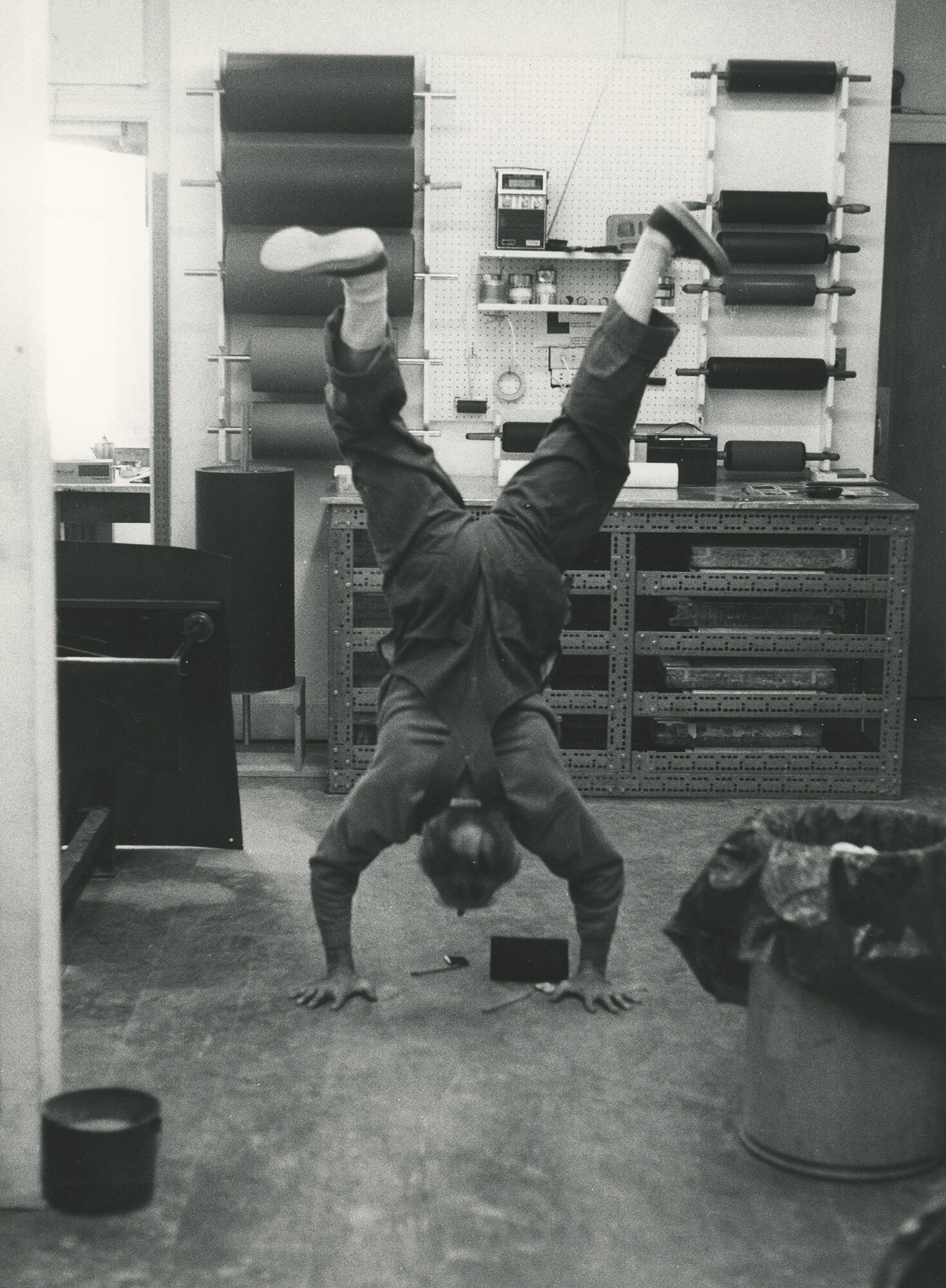 H.C. Westermann doing a handstand at Landfall Press in Chicago, 1972. Photograph by Johnnie Johnson. Image courtesy of Jack Lemon / Landfall Press Archive